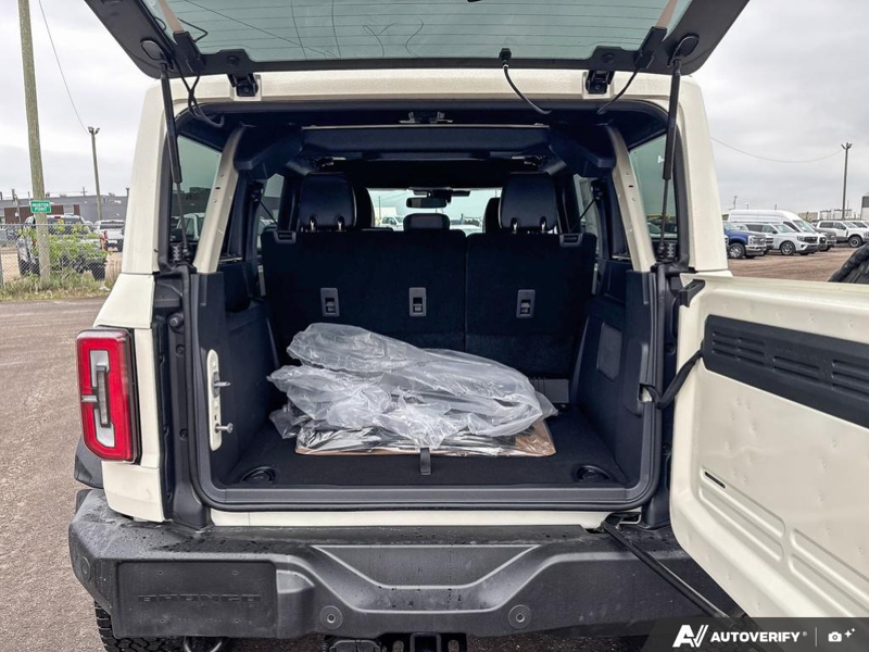 NEW 2026 Ford Bronco Outer Banks 60th Anniversary Edition - Wimbledon White Exterior / BLACK ONYX-LEATHER/VINYL Interior - $77,479 - Stock #E60681 - VIN 1FMEE8BH0TLA92542 - Photo 12