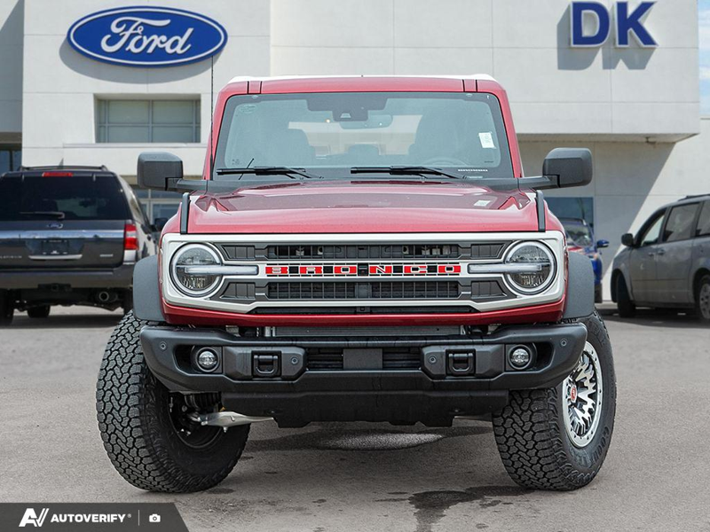NEW 2026 Ford Bronco Outer Banks - Ruby Red Metallic Tinted Clearcoat Exterior / BLACK ONYX-LEATHER/VINYL Interior - $84,782 - Stock #D60778 - VIN 1FMEE8BP2TLB36841 - Photo 2