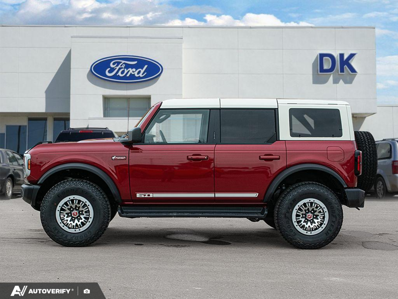 NEW 2026 Ford Bronco Outer Banks - Ruby Red Metallic Tinted Clearcoat Exterior / BLACK ONYX-LEATHER/VINYL Interior - $84,782 - Stock #D60778 - VIN 1FMEE8BP2TLB36841 - Photo 3