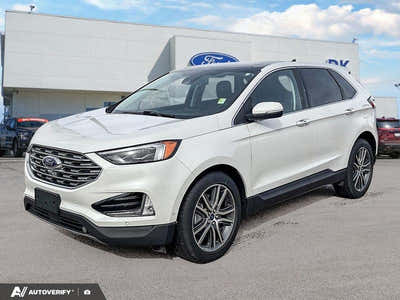 USED 2021 Ford Edge
 Titanium w/Leather, Moonroof, Nav, and More! - Star White Tri-coat Metallic Exterior / EBONY PERFORATED LEATHER Interior - $28,696 - Stock #D60205A - VIN 2FMPK4K95MBA55376