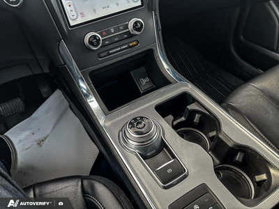 USED 2021 Ford Edge
 Titanium w/Leather, Moonroof, Nav, and More! - Star White Tri-coat Metallic Exterior / EBONY PERFORATED LEATHER Interior - $28,696 - Stock #D60205A - VIN 2FMPK4K95MBA55376