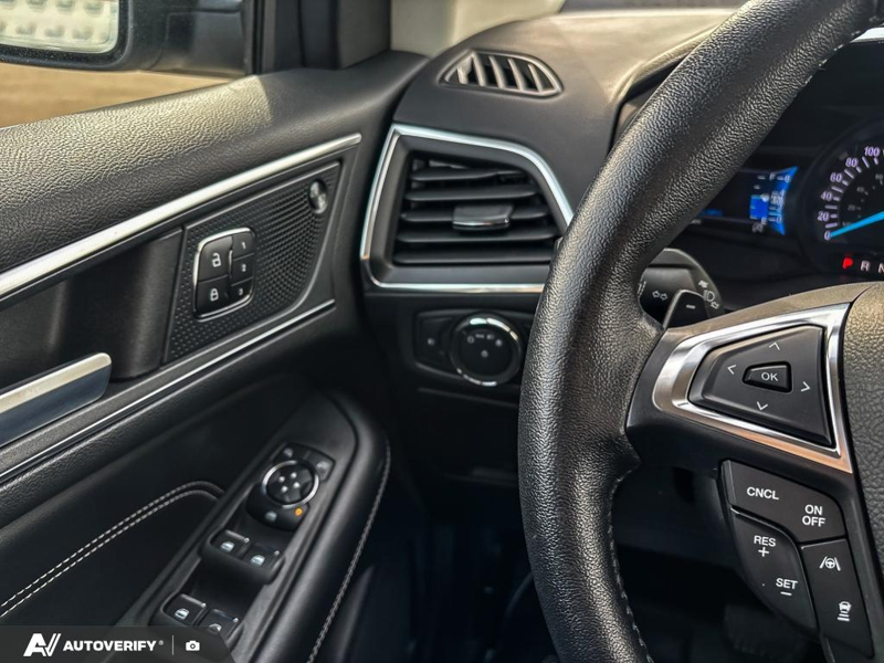 USED 2021 Ford Edge Titanium w/Leather, Moonroof, Nav, and More! - Star White Tri-coat Metallic Exterior / EBONY PERFORATED LEATHER Interior - $24,998 - Stock #D60205A - VIN 2FMPK4K95MBA55376 - Photo 12