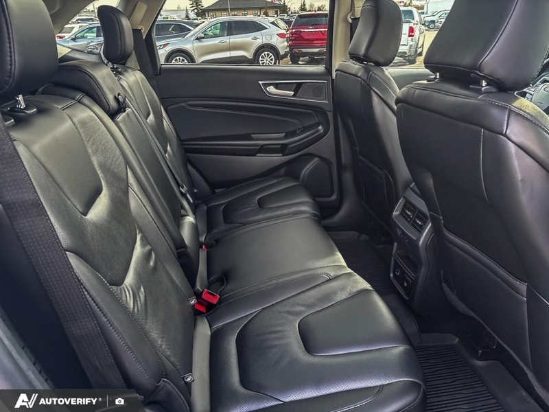 USED 2021 Ford Edge Titanium w/Leather, Moonroof, Nav, and More! - Star White Tri-coat Metallic Exterior / EBONY PERFORATED LEATHER Interior - $24,998 - Stock #D60205A - VIN 2FMPK4K95MBA55376 - Photo 16