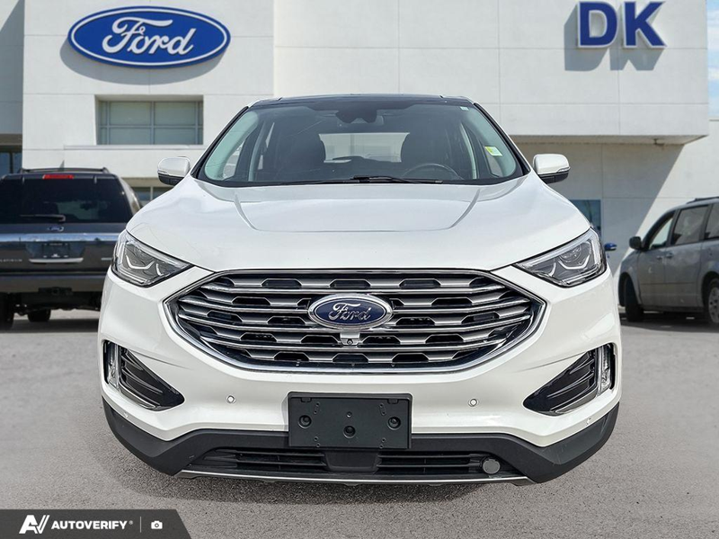 USED 2021 Ford Edge Titanium w/Leather, Moonroof, Nav, and More! - Star White Tri-coat Metallic Exterior / EBONY PERFORATED LEATHER Interior - $24,998 - Stock #D60205A - VIN 2FMPK4K95MBA55376 - Photo 2