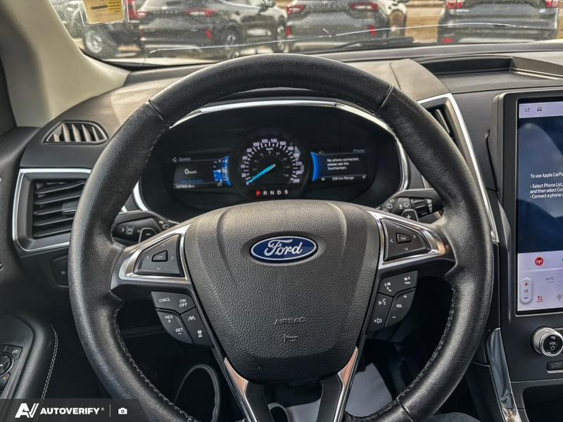 USED 2021 Ford Edge Titanium w/Leather, Moonroof, Nav, and More! - Star White Tri-coat Metallic Exterior / EBONY PERFORATED LEATHER Interior - $24,998 - Stock #D60205A - VIN 2FMPK4K95MBA55376 - Photo 9