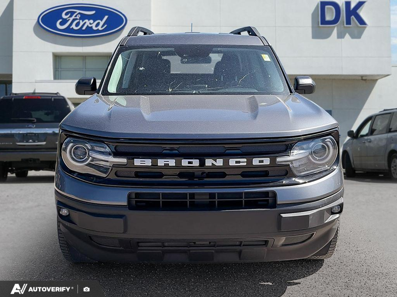 USED 2023 Ford Bronco Sport Outer Banks w/Leather, Tech Pkg, and More! - Carbonized Grey Metallic Exterior / Navy Interior - $29,999 - Stock #DR1666A - VIN 3FMCR9C6XPRE19311 - Photo 2