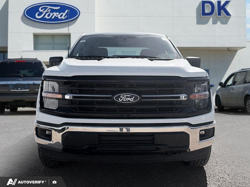 USED 2024 Ford F-150 XLT w/BLIS, Fordpass, and More! - Oxford White Exterior / Grey Interior - $50,898 - Stock #DP6436 - VIN 1FTFW3L5XRKE02580 - Photo 2