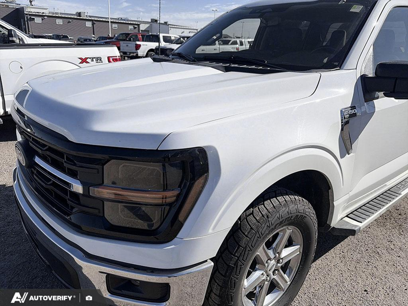 USED 2024 Ford F-150 XLT w/BLIS, Fordpass, and More! - Oxford White Exterior / Grey Interior - $50,898 - Stock #DP6436 - VIN 1FTFW3L5XRKE02580 - Photo 7