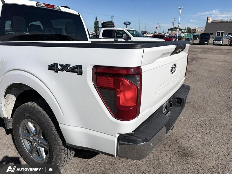 USED 2024 Ford F-150 XLT w/BLIS, Fordpass, and More! - Oxford White Exterior / Grey Interior - $50,898 - Stock #DP6436 - VIN 1FTFW3L5XRKE02580 - Photo 8