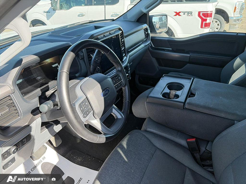 USED 2024 Ford F-150 XLT w/BLIS, Fordpass, and More! - Oxford White Exterior / Grey Interior - $50,898 - Stock #DP6436 - VIN 1FTFW3L5XRKE02580 - Photo 9