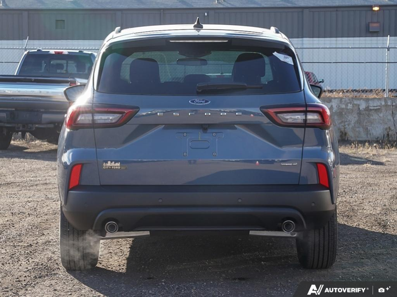 NEW 2025 Ford Escape ST-Line Hybrid - Vapor Blue Exterior / EBONY VINYL/ RED STITCHING Interior - $45,143 - Stock #E50102 - VIN 1FMCU9MZXSUA13070 - Photo 5