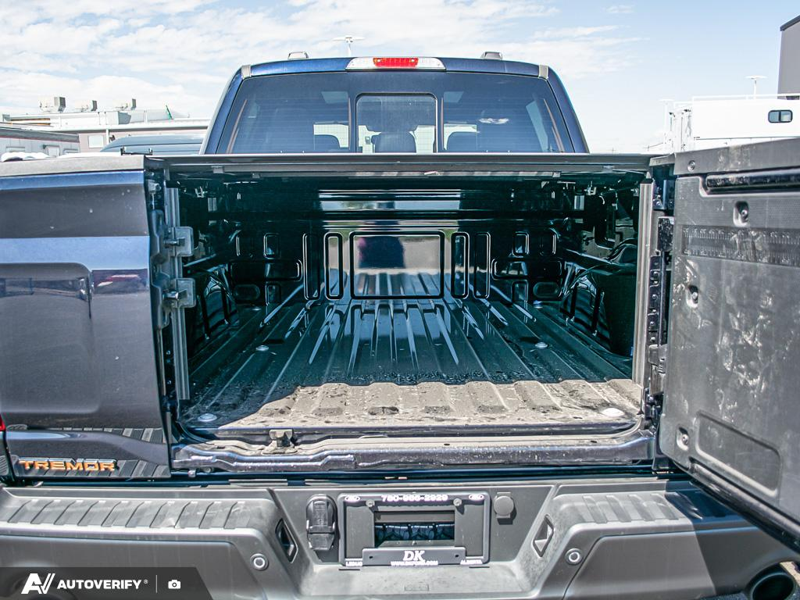 NEW 2025 Ford F-150 Tremor - Antimatter Blue Metallic Exterior / BLACK TREMOR LEATHER Interior - $86,269 - Stock #D51014 - VIN 1FTFW4L52SFC33028 - Photo 11