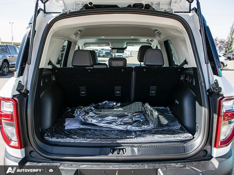 NEW 2026 Ford Bronco Sport Badlands - Oxford White Exterior / DARK SPACE GREY LEATHER Interior - $51,303 - Stock #D60807 - VIN 3FMCR9DA8TRF31909 - Photo 11