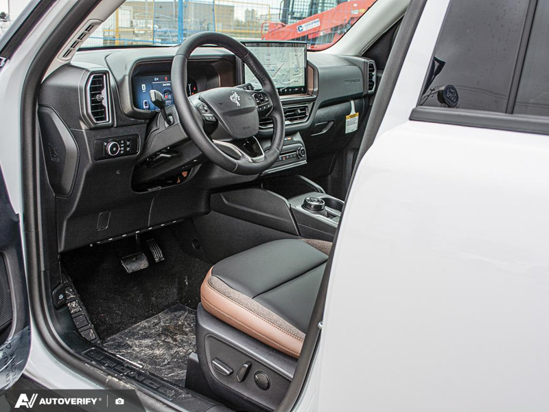 NEW 2026 Ford Bronco Sport Outer Banks - Oxford White Exterior / EBONY/ROAST, PREMIUM TRIMMED HTD FRONT BUCKET SEATS Interior - $40,391 - Stock #D60784 - VIN 3FMCR9CN7TRF12725 - Photo 12