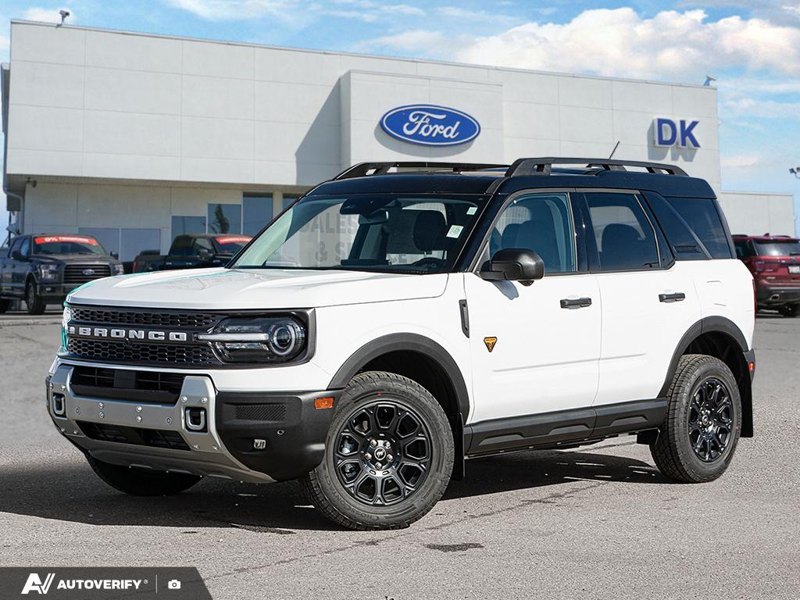 NEW 2026 Ford Bronco Sport Badlands - Oxford White Exterior / DARK SPACE GREY LEATHER Interior - $51,303 - Stock #D60807 - VIN 3FMCR9DA8TRF31909 - Photo 1