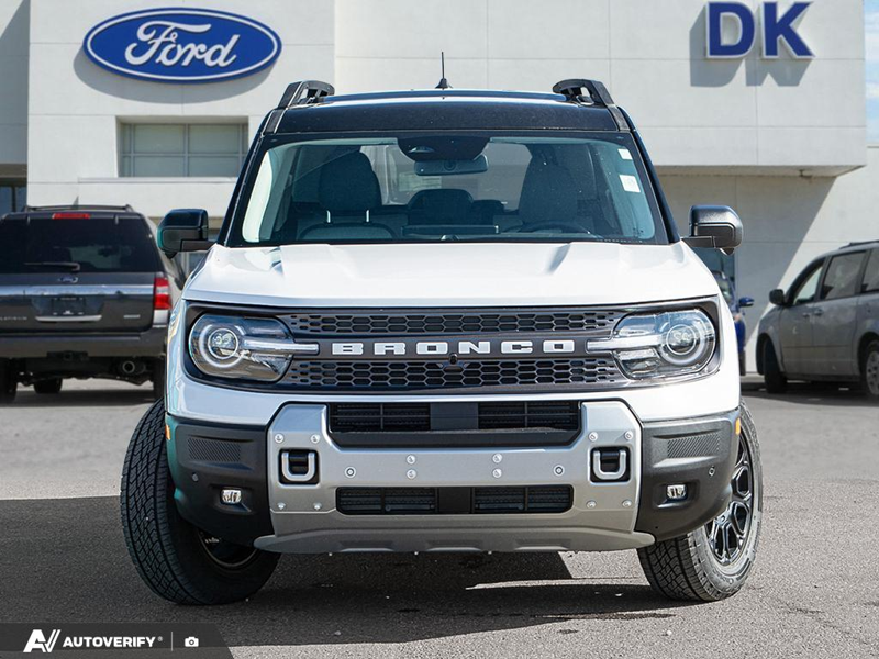 NEW 2026 Ford Bronco Sport Badlands - Oxford White Exterior / DARK SPACE GREY LEATHER Interior - $51,303 - Stock #D60807 - VIN 3FMCR9DA8TRF31909 - Photo 2