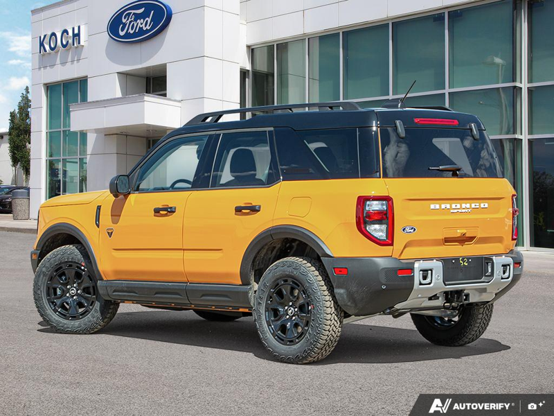 NEW 2026 Ford Bronco Sport Badlands - Orange Fury Metallic Tri-coat Exterior / DARK SPACE GREY LEATHER Interior - $50,370 - Stock #E60241 - VIN 3FMCR9DA8TRE10054 - Photo 4
