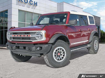 NEW 2026 Ford Bronco Outer Banks 60th Anniversary Edition - Ruby Red Tri-coat Metallic Exterior - $88,774 - Stock #E60405 - VIN 1FMEE8BP0TLA54929