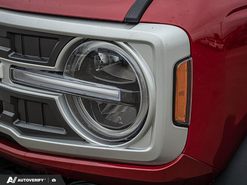 NEW 2026 Ford Bronco Outer Banks - Ruby Red Metallic Tinted Clearcoat Exterior / BLACK ONYX-LEATHER/VINYL Interior - $84,782 - Stock #D60778 - VIN 1FMEE8BP2TLB36841 - Photo 10