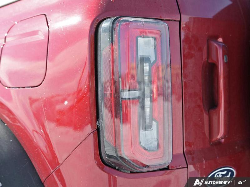 NEW 2026 Ford Bronco Outer Banks 60th Anniversary Edition - Ruby Red Tri-coat Metallic Exterior / BLACK ONYX-LEATHER/VINYL Interior - $88,774 - Stock #E60405 - VIN 1FMEE8BP0TLA54929 - Photo 12