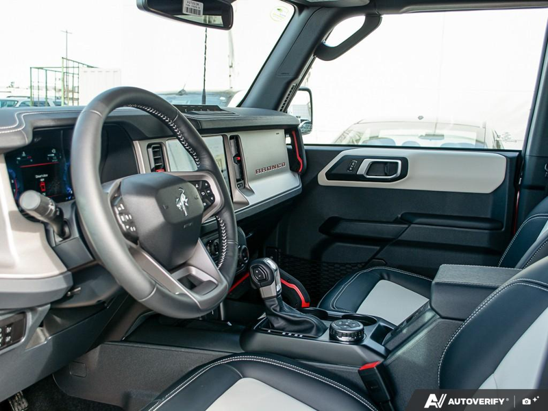 NEW 2026 Ford Bronco Outer Banks 60th Anniversary Edition - Ruby Red Tri-coat Metallic Exterior / BLACK ONYX-LEATHER/VINYL Interior - $88,574 - Stock #E60355 - VIN 1FMEE8BP6TLA60752 - Photo 13