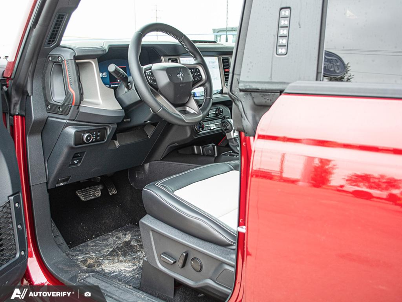 NEW 2026 Ford Bronco Outer Banks - Ruby Red Metallic Tinted Clearcoat Exterior / BLACK ONYX-LEATHER/VINYL Interior - $84,782 - Stock #D60778 - VIN 1FMEE8BP2TLB36841 - Photo 13