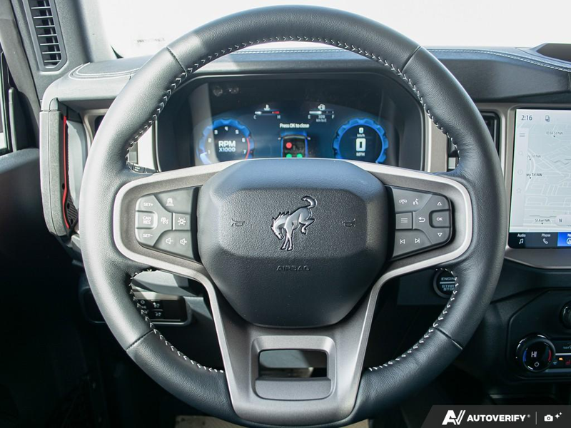 NEW 2026 Ford Bronco Outer Banks 60th Anniversary Edition - Ruby Red Tri-coat Metallic Exterior / BLACK ONYX-LEATHER/VINYL Interior - $88,574 - Stock #E60355 - VIN 1FMEE8BP6TLA60752 - Photo 14