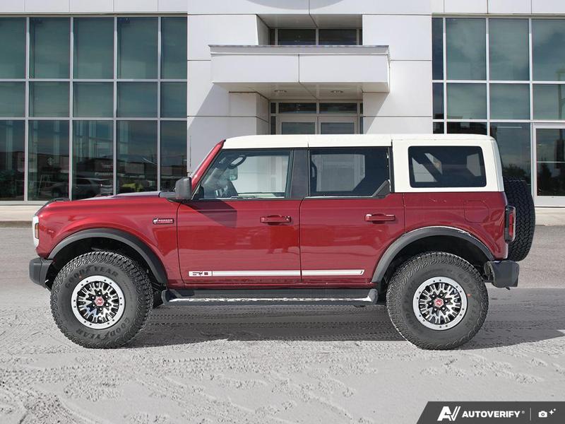 NEW 2026 Ford Bronco Outer Banks 60th Anniversary Edition - Ruby Red Tri-coat Metallic Exterior / BLACK ONYX-LEATHER/VINYL Interior - $88,774 - Stock #E60405 - VIN 1FMEE8BP0TLA54929 - Photo 2