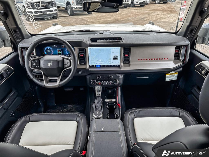 NEW 2026 Ford Bronco Outer Banks 60th Anniversary Edition - Wimbledon White Exterior / BLACK ONYX-LEATHER/VINYL Interior - $77,479 - Stock #E60681 - VIN 1FMEE8BH0TLA92542 - Photo 24