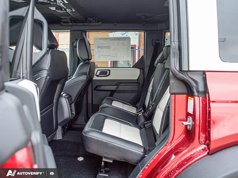 NEW 2026 Ford Bronco Outer Banks - Ruby Red Metallic Tinted Clearcoat Exterior / BLACK ONYX-LEATHER/VINYL Interior - $84,782 - Stock #D60778 - VIN 1FMEE8BP2TLB36841 - Photo 27