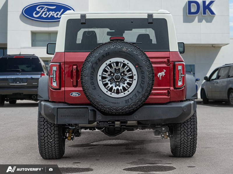 NEW 2026 Ford Bronco Outer Banks - Ruby Red Metallic Tinted Clearcoat Exterior / BLACK ONYX-LEATHER/VINYL Interior - $84,782 - Stock #D60778 - VIN 1FMEE8BP2TLB36841 - Photo 5