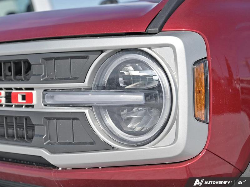 NEW 2026 Ford Bronco Outer Banks 60th Anniversary Edition - Ruby Red Tri-coat Metallic Exterior / BLACK ONYX-LEATHER/VINYL Interior - $88,774 - Stock #E60405 - VIN 1FMEE8BP0TLA54929 - Photo 10