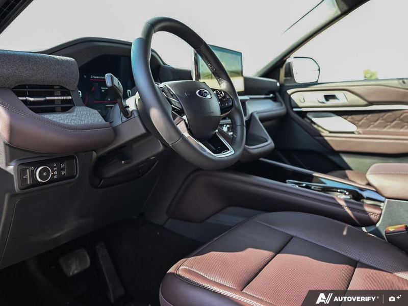 NEW 2026 Ford Explorer Platinum - Star White Tri-Coat Exterior / MOJAVE DUSK, PREM. LEATHER SEATING SURFACES SPORT CAPTAIN CHAIRS Interior - $64,348 - Stock #E61073 - VIN 1FMUK8HHXTGC46954 - Photo 13