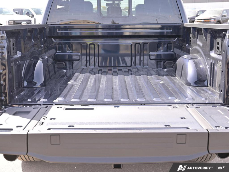 NEW 2026 Ford F-150 LARIAT - Antimatter Blue Metallic Exterior / BLACK ACTIVE X Interior - $86,839 - Stock #E60660 - VIN 1FTFW5L50TFA39914 - Photo 11