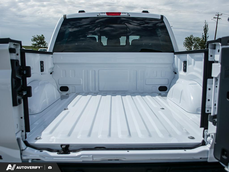 NEW 2026 Ford F-150 Tremor - Oxford White Exterior / BLACK TREMOR LEATHER Interior - $88,579 - Stock #D60553 - VIN 1FTFW4L82TFB03584 - Photo 11