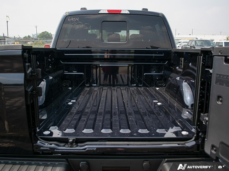 NEW 2026 Ford F-150 LARIAT - Antimatter Blue Metallic Exterior / BLACK ACTIVE X Interior - $82,707 - Stock #E60868 - VIN 1FTFW5L87TFB46954 - Photo 11