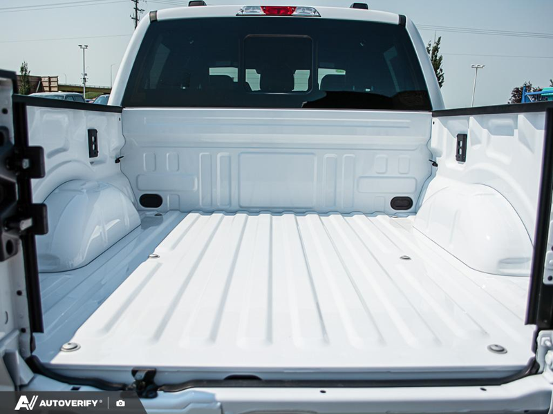 NEW 2026 Ford F-150 Tremor - Oxford White Exterior / BLACK TREMOR LEATHER Interior - $81,787 - Stock #D60658 - VIN 1FTFW4L88TFB48240 - Photo 11