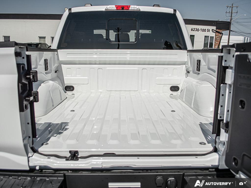 NEW 2026 Ford F-150 Platinum - Star White Tri-coat Metallic Exterior / BLACK LEATHER Interior - $100,750 - Stock #E60892 - VIN 1FTFW7L80TFB52817 - Photo 11