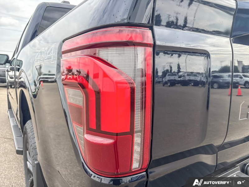 NEW 2026 Ford F-150 LARIAT - Antimatter Blue Metallic Exterior / BLACK ACTIVE X Interior - $88,762 - Stock #E60900 - VIN 1FTFW5L84TFB69768 - Photo 11