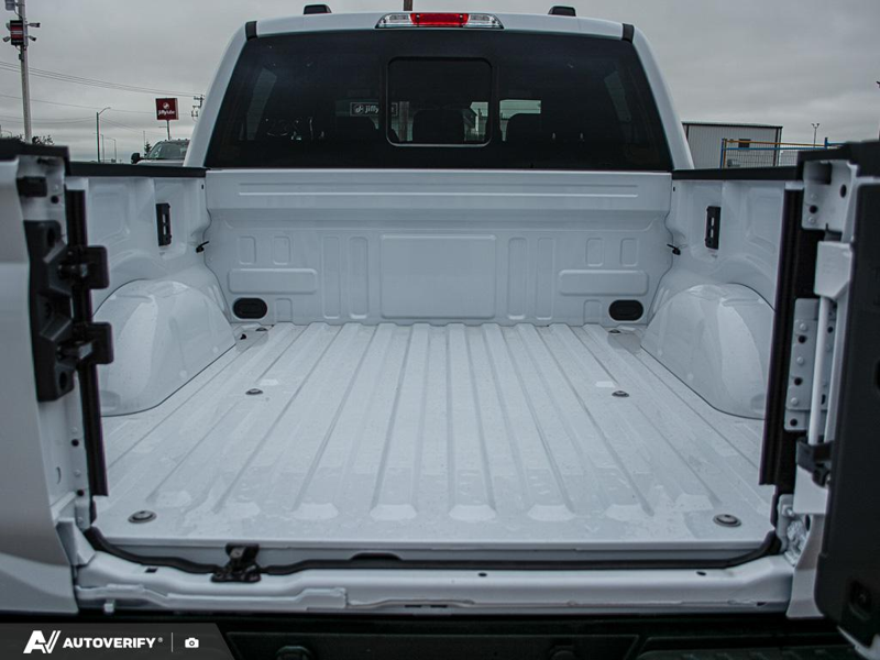 NEW 2026 Ford F-150 LARIAT - Oxford White Exterior / BLACK ACTIVE X Interior - $79,862 - Stock #D60709 - VIN 1FTFW5L82TFB78338 - Photo 11