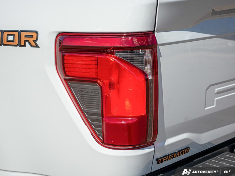 NEW 2026 Ford F-150 Tremor - Avalanche Exterior / BLACK SPORT CLOTH Interior - $75,874 - Stock #E60502 - VIN 1FTFW4L81TFA63515 - Photo 12
