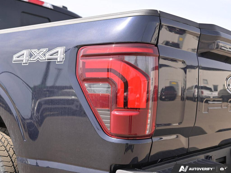 NEW 2026 Ford F-150 LARIAT - Antimatter Blue Metallic Exterior / BLACK ACTIVE X Interior - $86,839 - Stock #E60660 - VIN 1FTFW5L50TFA39914 - Photo 12