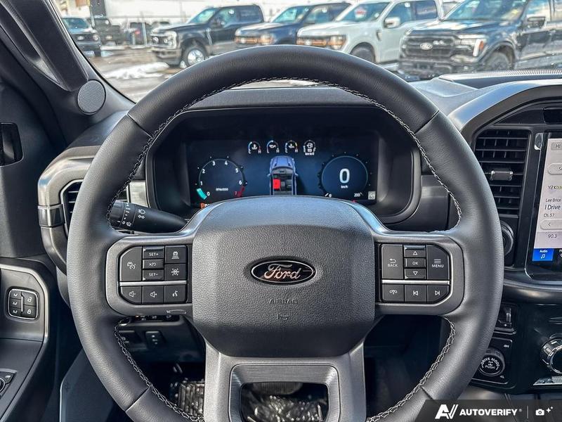 NEW 2026 Ford F-150 LARIAT - Star White Tri-coat Metallic Exterior / BLACK ACTIVE X Interior - $91,594 - Stock #E60564 - VIN 1FTFW5L85TFA11925 - Photo 14