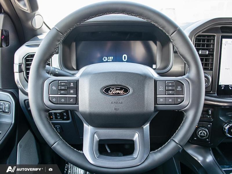 NEW 2026 Ford F-150 LARIAT - Star White Tri-coat Metallic Exterior / BLACK ACTIVE X Interior - $90,457 - Stock #D60510 - VIN 1FTFW5L88TFA91382 - Photo 14