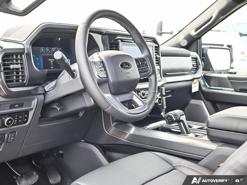 NEW 2026 Ford F-150 LARIAT - Antimatter Blue Metallic Exterior / BLACK ACTIVE X Interior - $88,762 - Stock #E60899 - VIN 1FTFW5L83TFB68837 - Photo 13