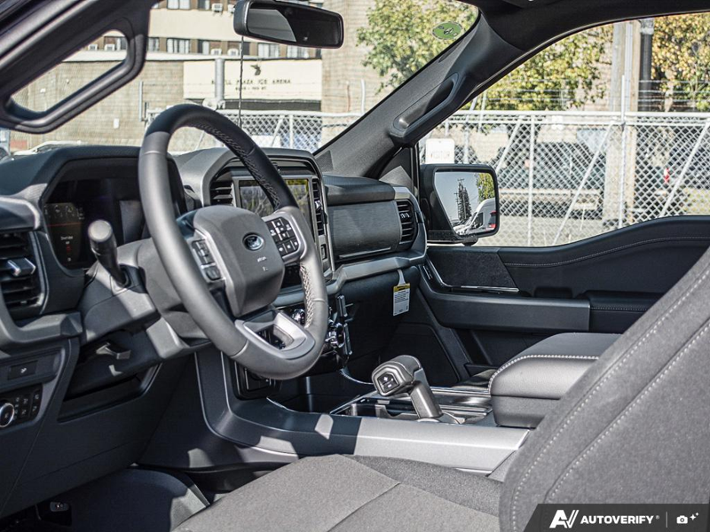 NEW 2026 Ford F-150 XLT - Antimatter Blue Metallic Exterior / BLACK, UNIQUE SPORT CLOTH 40/CONSOLE/40 FRONT-SEATS Interior - $72,929 - Stock #E61063 - VIN 1FTFW3L57TFB79088 - Photo 13