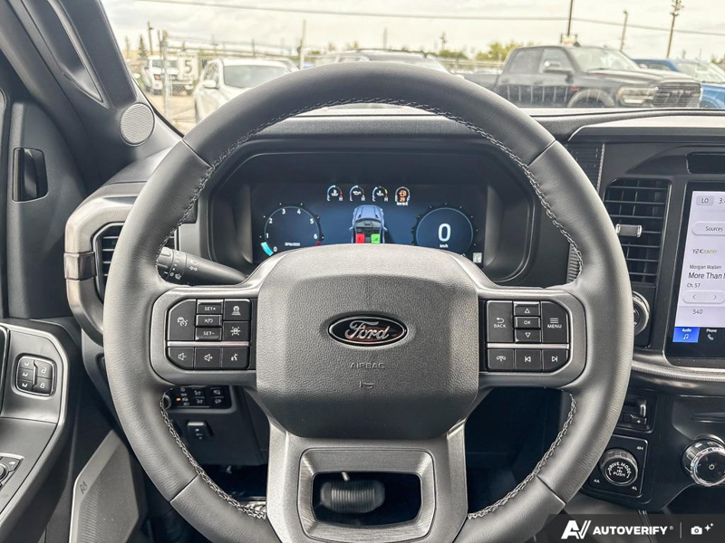 NEW 2026 Ford F-150 LARIAT - Antimatter Blue Metallic Exterior / BLACK ACTIVE X Interior - $88,762 - Stock #E60900 - VIN 1FTFW5L84TFB69768 - Photo 14