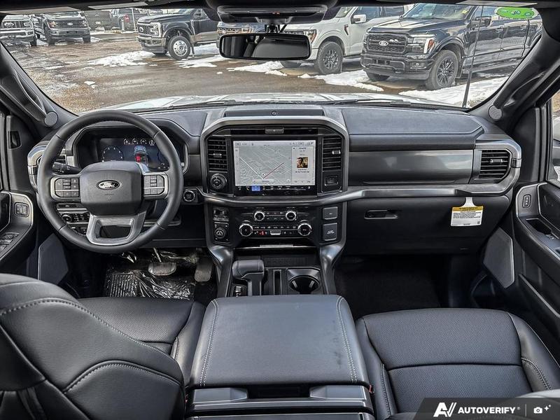NEW 2026 Ford F-150 LARIAT - Star White Tri-coat Metallic Exterior / BLACK ACTIVE X Interior - $91,594 - Stock #E60564 - VIN 1FTFW5L85TFA11925 - Photo 24