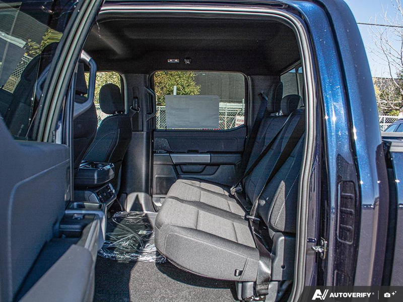 NEW 2026 Ford F-150 XLT - Antimatter Blue Metallic Exterior / BLACK, UNIQUE SPORT CLOTH 40/CONSOLE/40 FRONT-SEATS Interior - $72,929 - Stock #E61063 - VIN 1FTFW3L57TFB79088 - Photo 26