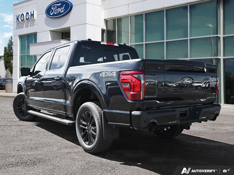 NEW 2026 Ford F-150 LARIAT - Antimatter Blue Metallic Exterior / BLACK ACTIVE X Interior - $86,189 - Stock #E60772 - VIN 1FTFW5L89TFB15432 - Photo 4